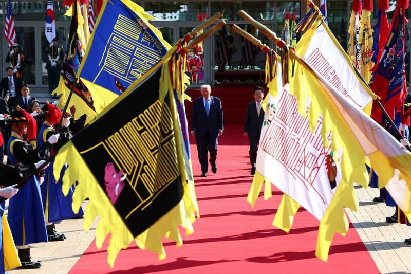 李在明以盛大仪式欢迎川普到访。（路透）