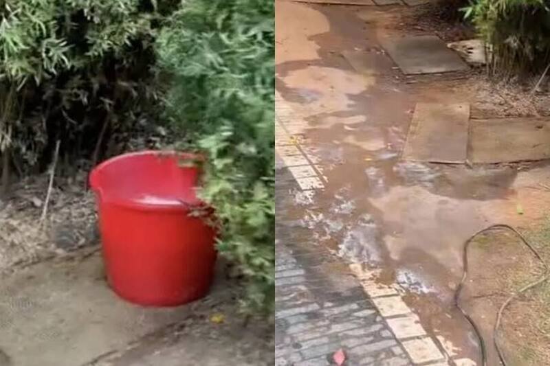 中国万福广场公园放水桶供民众露天大小便，在被网友投诉后已移走，但现场仍有满地尿渍。（翻摄自极目新闻）