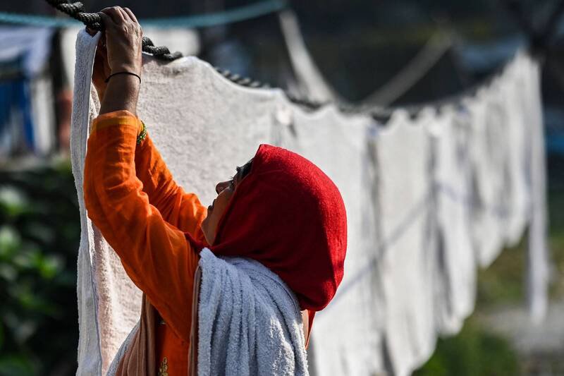 晒衣服示意图。（法新社）